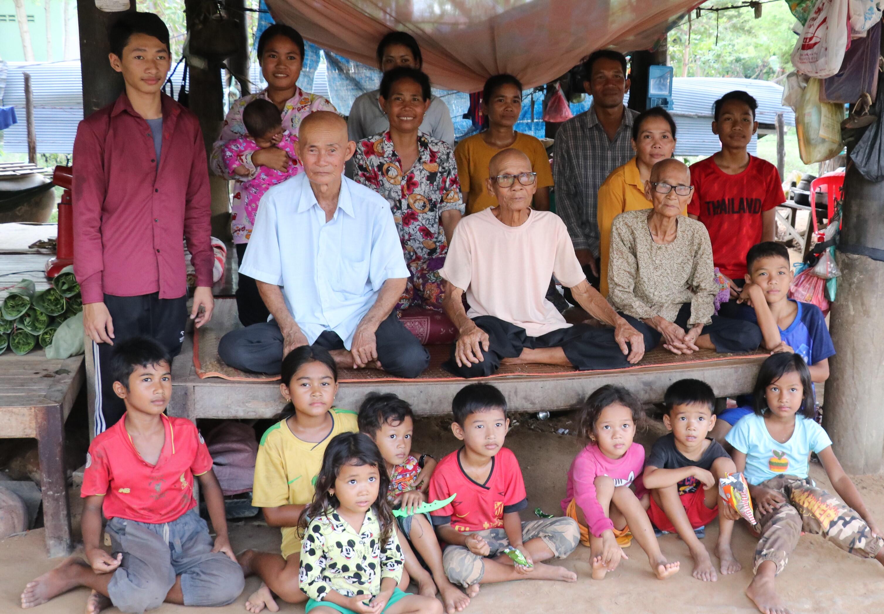 Population Census reaches remote parts of rural Cambodia, here three-generation family captured.